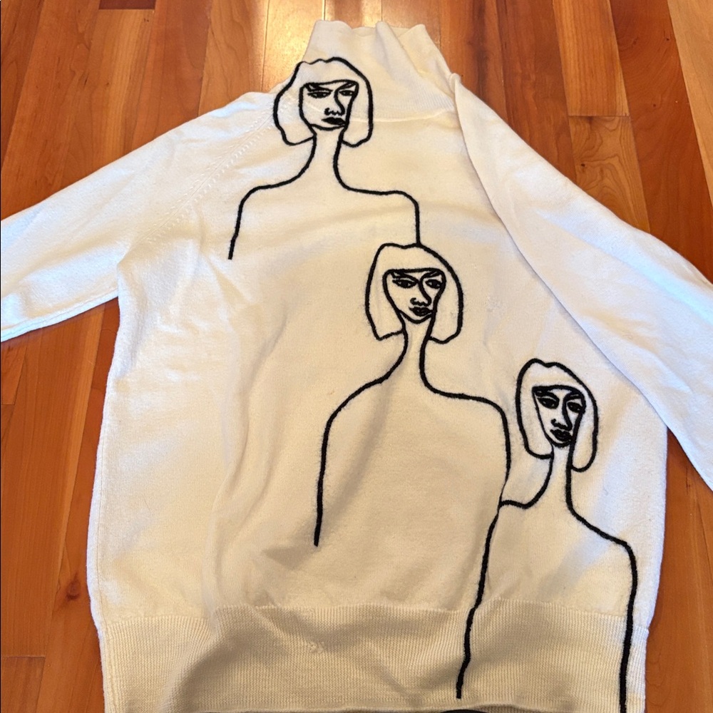 White Sweater with Artistic Face Design